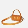 HOZEN Bags Quilted Vegan Leather Mini Duffle Bag | Camel