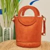 Minuit Sur Terre Bags Gaia Round Handle Vegan Suede Handbag | Paprika
