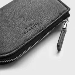 Oliver Co. London Zipped Apple Leather Vegan Pouch | Black Accessories